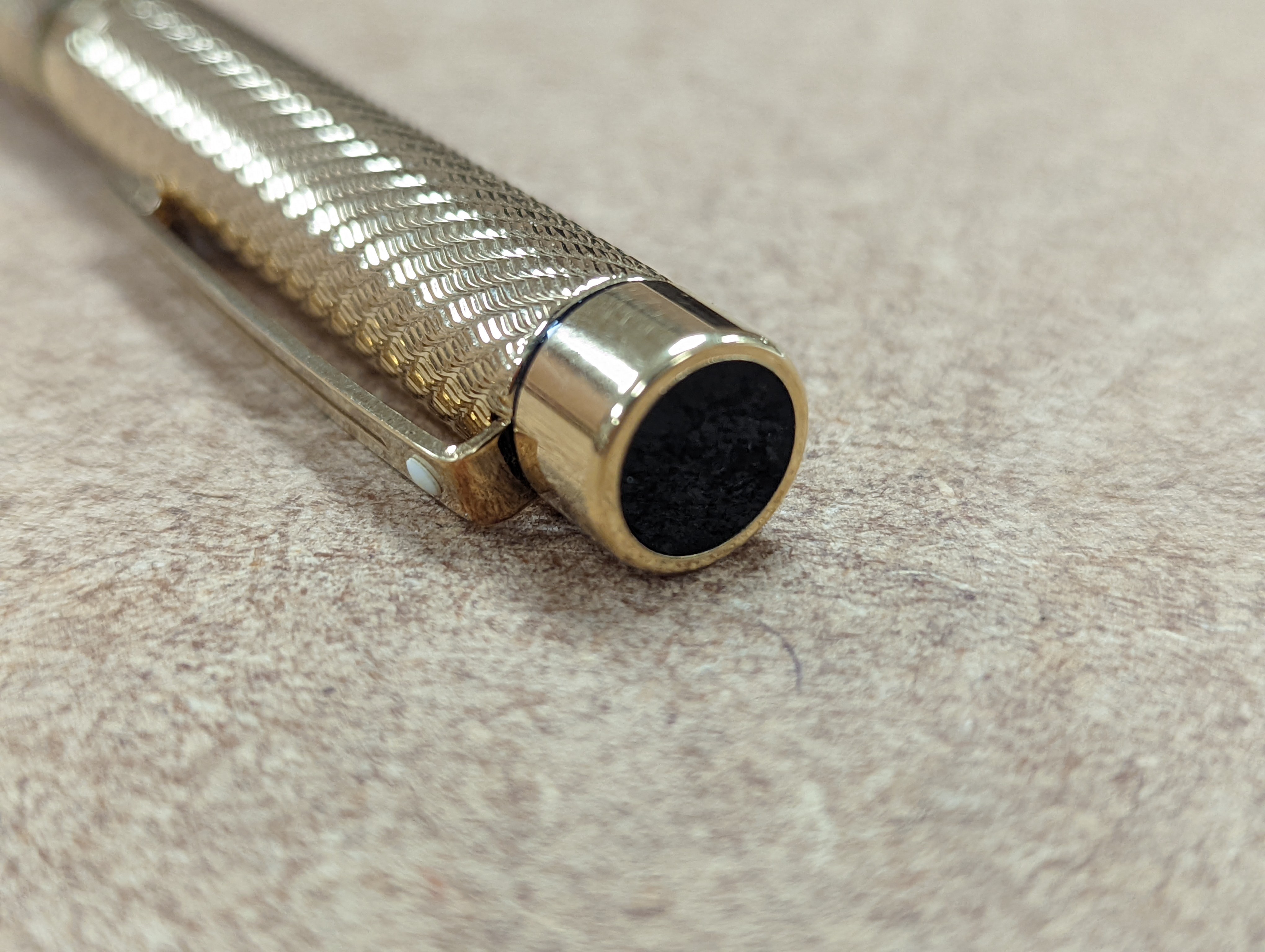A cased gold plated Shaeffer fountain pen.